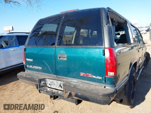 1996 GMC Suburban z VIN 1GKFK16R3TJ703465, wystawiony jako IAAI lot #41325441 z przebiegiem 271 871 mil mil oraz . Historia ofert i sprzedaży dostępna na DreamBid. Obrazek 17.