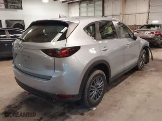 2017 Mazda CX-5 Sport with VIN JM3KFBBL1H0116157, listed as a IAAI auction lot 41584679 with 92,325 mi miles. Bid and sale history available at carsss.com. Image 4.