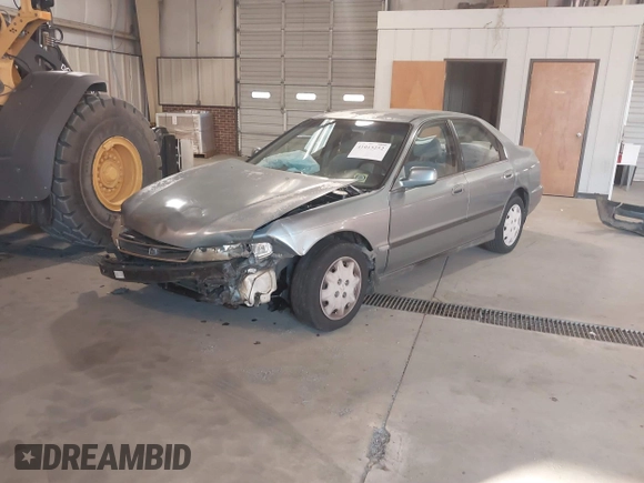 1996 Honda Accord LX with VIN 1HGCD563XTA141867, listed as a IAAI auction lot 41015252 with 420,800 mi miles and . Bid and sale history available at carsss.com. Image 17.