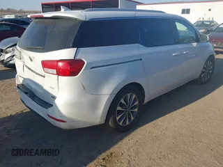 2015 Kia Sedona EX with VIN KNDMC5C12F6034991, listed as a IAAI auction lot 41971340 with 148,231 mi miles. Bid and sale history available at carsss.com. Image 4.