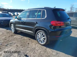 2014 Volkswagen Tiguan S z VIN WVGBV3AX4EW581302, wystawiony jako IAAI lot #41033175 z przebiegiem 69 791 mil mil oraz . Historia ofert i sprzedaży dostępna na DreamBid. Obrazek 3.