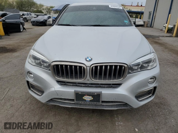 2019 BMW X6 sDrive35i z VIN 5UXKU0C5XK0G92812, wystawiony jako Copart lot #65926534 z przebiegiem Nie podano mil oraz Szkoda całkowita • Salvage title. Historia ofert i sprzedaży dostępna na DreamBid. Obrazek 5.