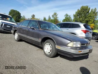 1993 Oldsmobile 88 z VIN 1G3HN53L4PH310087, wystawiony jako Copart lot #75523874 z przebiegiem 151 178 mil mil oraz Czysty tytuł • Clean title. Historia ofert i sprzedaży dostępna na DreamBid. Obrazek 4.