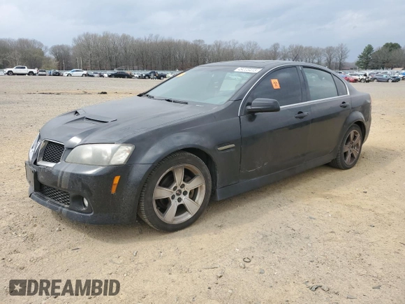2009 Pontiac G8 z VIN 6G2ER57709L240146, wystawiony jako Copart lot #49223415 z przebiegiem 203 008 mil mil oraz Czysty tytuł • Clean title. Historia ofert i sprzedaży dostępna na DreamBid. Obrazek 1.