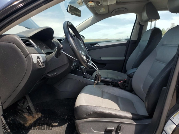 2013 Volkswagen Jetta Hybrid SE with VIN 3VW637AJXDM225219, listed as a Copart auction lot 63197905 with 97,672 mi miles and Clean title. Bid and sale history available at DreamBid. Image 7.