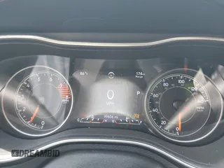 2020 Jeep Cherokee Trailhawk with VIN 1C4PJMBX5LD530720, listed as a IAAI auction lot 42404948 with 99,606 mi miles and . Bid and sale history available at DreamBid. Image 7.