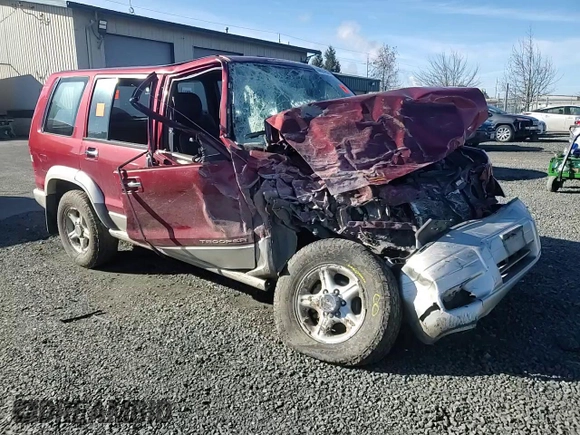 1999 Isuzu Trooper S with VIN JACDJ58X7X7931091, listed as a Copart auction lot 44824285 with Not provided miles and Salvage title. Bid and sale history available at DreamBid. Image 12.