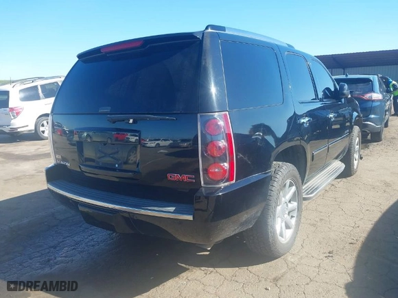 2010 GMC Yukon Denali with VIN 1GKUKEEF2AR235104, listed as a IAAI auction lot 41669918 with 133648 miles. Bid and sale history available at carsss.com. Image 4.