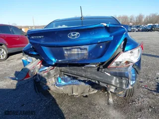 2015 Hyundai Accent GLS with VIN KMHCT4AE6FU916149, listed as a IAAI auction lot 41082268 with 153,219 mi miles. Bid and sale history available at carsss.com. Image 16.