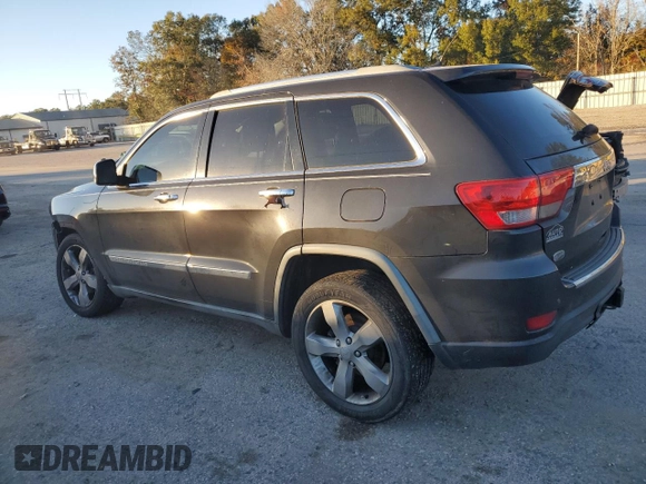 2011 Jeep Grand Cherokee Overland with VIN 1J4RS6GG0BC557302, listed as a Copart auction lot 83851734 with 195,443 mi miles and Salvage Title. Bid and sale history available at DreamBid. Image 2.