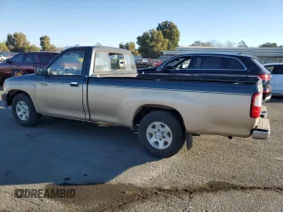 1993 Toyota T100 z VIN JT4VD10C2P0007486, wystawiony jako Copart lot #77669724 z przebiegiem 150 936 mil mil oraz Tytuł czysty. Historia ofert i sprzedaży dostępna na DreamBid. Obrazek 2.