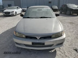 2001 Mitsubishi Mirage ES z VIN JA3AY26CX1U030593, wystawiony jako Copart lot #83749264 z przebiegiem 107 641 mil mil oraz Szkoda całkowita • Salvage title. Historia ofert i sprzedaży dostępna na DreamBid. Obrazek 5.