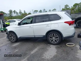 2016 Mitsubishi Outlander GT z VIN JA4JZ4AX1GZ012333, wystawiony jako IAAI lot #42186100 z przebiegiem 163 306 mil mil oraz . Historia ofert i sprzedaży dostępna na DreamBid. Obrazek 15.