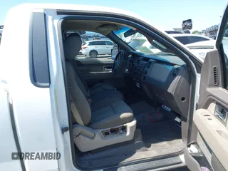 2009 Ford F-150 XL with VIN 1FTRF12W79KC14353, listed as a IAAI auction lot 42001571 with 224,190 mi miles and . Bid and sale history available at carsss.com. Image 5.