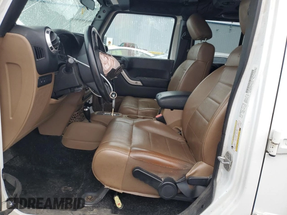 2012 Jeep Wrangler Unlimited Rubicon with VIN 1C4HJWFG7CL188381, listed as a Copart auction lot 45939075 with 140,516 mi miles and Clean title. Bid and sale history available at DreamBid. Image 7.