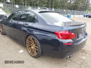 2015 BMW 5 Series 528i with VIN WBA5A5C57FD513039, listed as a IAAI auction lot 42262592 with 79,328 mi miles and . Bid and sale history available at DreamBid. Image 3.