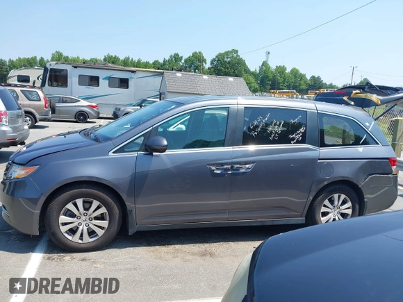 2014 Honda Odyssey EX-L with VIN 5FNRL5H63EB073585, listed as a IAAI auction lot 42673004 with 119,971 mi miles and . Bid and sale history available at DreamBid. Image 14.