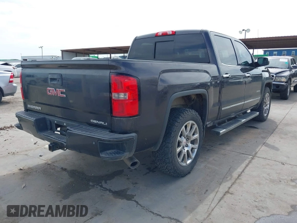 2015 GMC Sierra 1500 Denali with VIN 3GTU2WEJ2FG509236, listed as a IAAI auction lot 41771790 with 219,043 mi miles. Bid and sale history available at carsss.com. Image 4.