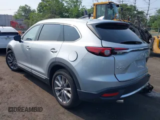2020 Mazda CX-9 Grand Touring with VIN JM3TCBDY6L0424584, listed as a IAAI auction lot 42473920 with 32,385 mi miles and . Bid and sale history available at DreamBid. Image 3.