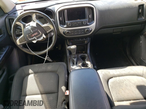 2015 GMC Canyon 4WD SLE with VIN 1GTG6BE34F1252557, listed as a Copart auction lot 61313294 with 16,084 mi miles and Salvage Title. Bid and sale history available at carsss.com. Image 8.