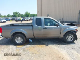 2016 Nissan Frontier SV z VIN 1N6AD0CW0GN760285, wystawiony jako IAAI lot #42434781 z przebiegiem 52 864 mil mil oraz . Historia ofert i sprzedaży dostępna na DreamBid. Obrazek 13.