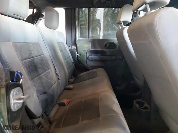 2009 Jeep Wrangler Unlimited X with VIN 1J4GA39119L740011, listed as a Copart auction lot 46295825 with 105,067 mi miles and Salvage Title. Bid and sale history available at carsss.com. Image 10.