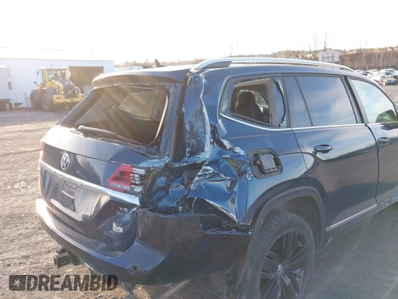 2019 Volkswagen Atlas SEL with VIN 1V2MR2CA9KC608025, listed as a IAAI auction lot 41866519 with 112,477 mi miles and . Bid and sale history available at DreamBid. Image 6.