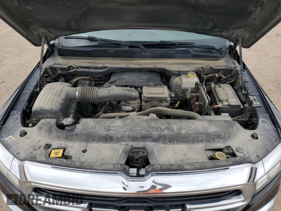 2021 Ram 1500 Big Horn z VIN 1C6RREFT4MN750643, wystawiony jako Copart lot #55787175 z przebiegiem 102 014 mil mil oraz Szkoda całkowita • Salvage title. Historia ofert i sprzedaży dostępna na DreamBid. Obrazek 11.