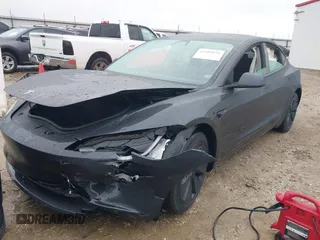 2025 Tesla Model 3 Long Range with VIN 5YJ3E1EA5SF911256, listed as a IAAI auction lot 41509976 with 1,806 mi miles. Bid and sale history available at carsss.com. Image 18.