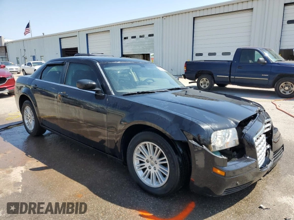 2009 Chrysler 300 LX with VIN 2C3KA43D49H615515, listed as a Copart auction lot 52409715 with 209,912 mi miles and Salvage Title. Bid and sale history available at carsss.com. Image 4.
