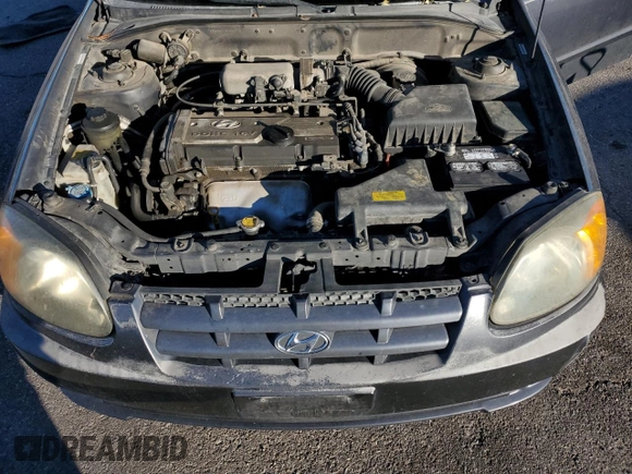 2005 Hyundai Accent GLS with VIN KMHCG45C95U665574, listed as a Copart auction lot 82603804 with 154,187 mi miles and Salvage Title. Bid and sale history available at carsss.com. Image 12.