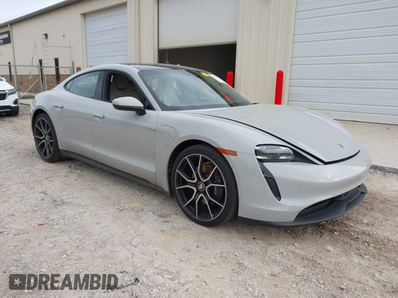 2024 Porsche Taycan with VIN WP0AA2Y11RSA12415, listed as a IAAI auction lot 41511772 with 12,066 mi miles and . Bid and sale history available at DreamBid. Image 1.