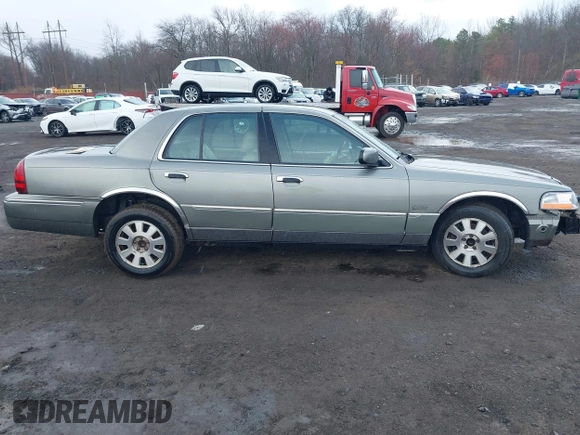 2003 Mercury Grand Marquis LS Premium with VIN 2MEFM75WX3X634344, listed as a IAAI auction lot 41888397 with 129,651 mi miles and . Bid and sale history available at DreamBid. Image 13.