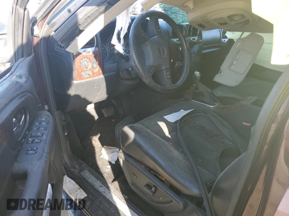 2007 GMC Envoy SLT with VIN 1GKDT13SX72107510, listed as a Copart auction lot 73031874 with Not Provided miles and Salvage Title. Bid and sale history available at DreamBid. Image 8.