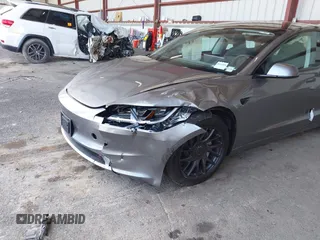 2025 Tesla Model 3 Long Range with VIN 5YJ3E1EB4SF943771, listed as a IAAI auction lot 42330181 with 3,533 mi miles and . Bid and sale history available at DreamBid. Image 6.