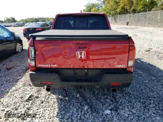 2021 Honda Ridgeline RTL-E with VIN 5FPYK3F79MB011161, listed as a Copart auction lot 67878013 with 0 mi miles and Salvage Title. Bid and sale history available at carsss.com. Image 6.