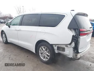 2023 Chrysler Pacifica Touring L with VIN 2C4RC1BG6PR520945, listed as a IAAI auction lot 41591128 with 70,351 mi miles and . Bid and sale history available at DreamBid. Image 3.