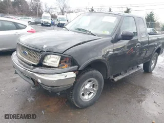 2000 Ford F-150 XL with VIN 1FTRX18W9YNA63551, listed as a IAAI auction lot 41446703 with 1 mi miles. Bid and sale history available at carsss.com. Image 2.