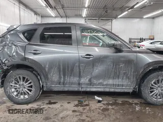 2020 Mazda CX-5 Touring with VIN JM3KFBCM0L0843242, listed as a IAAI auction lot 41536075 with 31,849 mi miles. Bid and sale history available at carsss.com. Image 13.