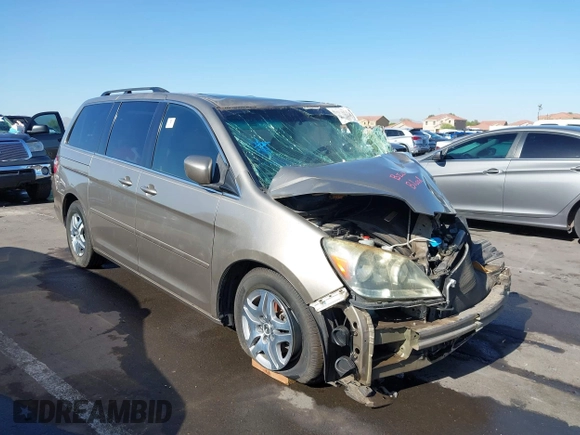 2005 Honda Odyssey EX-L with VIN 5FNRL38755B063203, listed as a IAAI auction lot 41073372 with Not provided miles and . Bid and sale history available at DreamBid. Image 1.