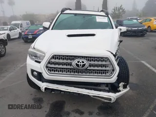 2016 Toyota Tacoma SR with VIN 3TMCZ5AN0GM030469, listed as a IAAI auction lot 41665255 with 178,591 mi miles and . Bid and sale history available at carsss.com. Image 12.