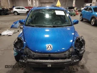 2004 Volkswagen New Beetle Coupe GLS with VIN 3VWCK31C14M421761, listed as a IAAI auction lot 41771431 with 76,184 mi miles. Bid and sale history available at carsss.com. Image 13.