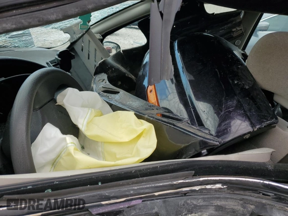 2000 Saturn SL with VIN 1G8ZK5274YZ145472, listed as a Copart auction lot 42871945 with Not provided miles and Salvage title. Bid and sale history available at DreamBid. Image 7.