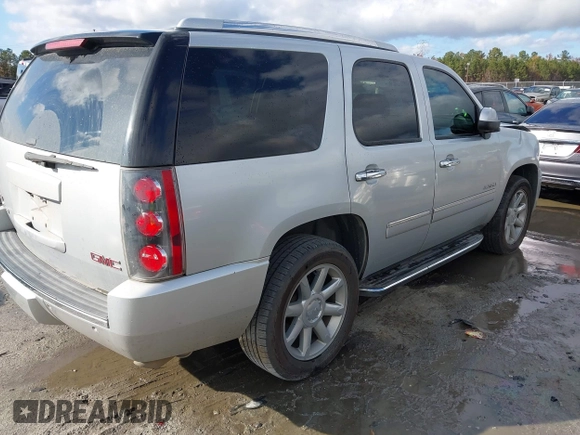2012 GMC Yukon Denali with VIN 1GKS1EEF0CR256515, listed as a IAAI auction lot 41079993 with 207,470 mi miles. Bid and sale history available at carsss.com. Image 4.