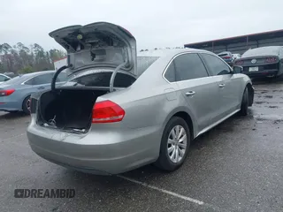 2012 Volkswagen Passat SE with VIN 1VWBH7A36CC077412, listed as a IAAI auction lot 41651796 with 113,259 mi miles and . Bid and sale history available at DreamBid. Image 4.