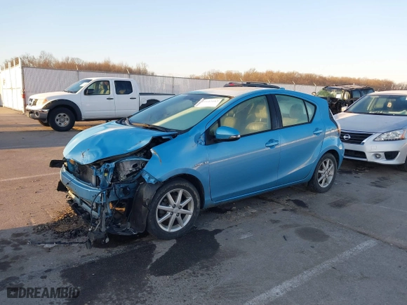 2015 Toyota Prius c One with VIN JTDKDTB37F1086741, listed as a IAAI auction lot 41642663 with 121,313 mi miles. Bid and sale history available at carsss.com. Image 2.
