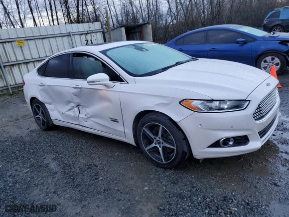 2016 Ford Fusion Energi Titanium with VIN 3FA6P0SU4GR305393, listed as a Copart auction lot 50749715 with 100,512 mi miles and Salvage Title. Bid and sale history available at carsss.com. Image 4.