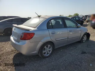 2011 Kia Rio LX with VIN KNADH4A37B6954946, listed as a Copart auction lot 52342385 with 151,984 mi miles and Salvage Title. Bid and sale history available at carsss.com. Image 3.