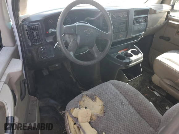 2007 Chevrolet Express Cargo z VIN 1GCFG15X571120155, wystawiony jako Copart lot #60756575 z przebiegiem 209 938 mil mil oraz Nie do naprawy • Non repairable. Historia ofert i sprzedaży dostępna na DreamBid. Obrazek 8.
