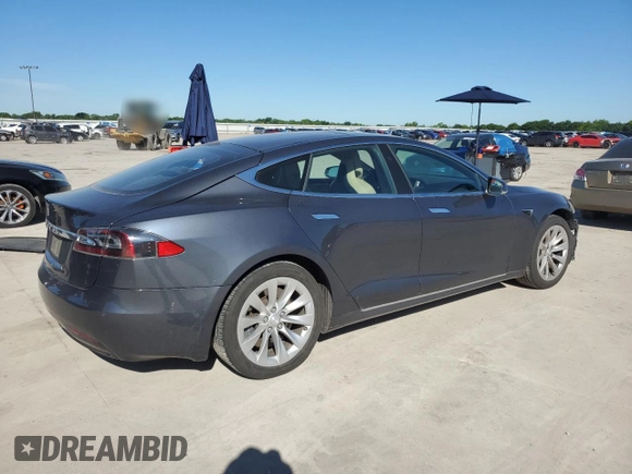 2017 Tesla Model S 60 with VIN 5YJSA1E14HF184188, listed as a Copart auction lot 55836495 with 94,623 mi miles and Salvage title. Bid and sale history available at DreamBid. Image 3.